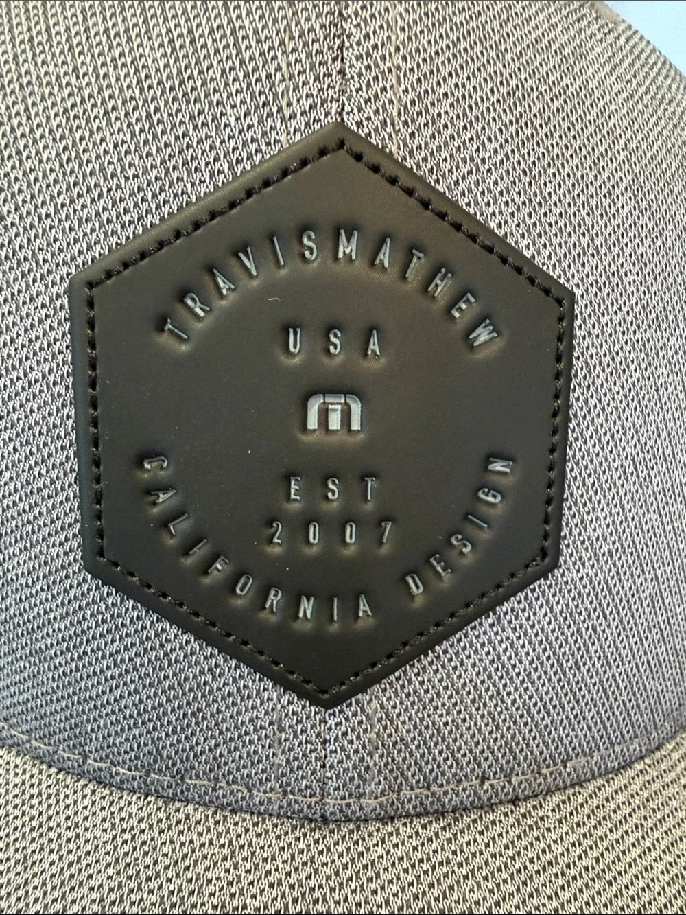 Travis Mathew Gray Flexfit Cap with Black Hex Patch